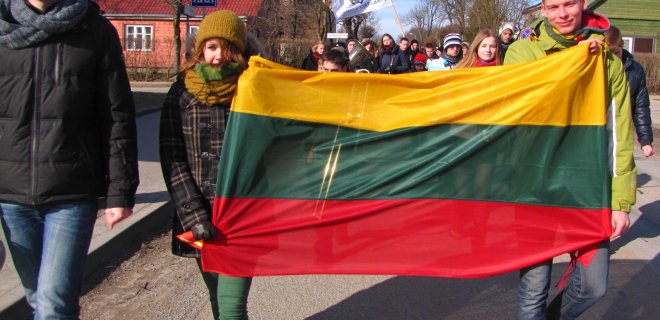 Vienas iš pagrindinių šventinės eisenos iniciatorių - Dominykas Mazur (dešinėje)