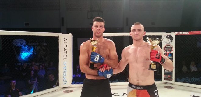 Sporto klubo „Pantera“ sportininkas Arnoldas Eiza (kairėje) su priešininku Lenkijos atstovu Tomaš Cimoch.