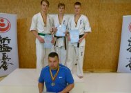 M. Lukšys, J. Griškus, Ž. Globys ir „Kumite“ klubo prezidentas bei treneris Artūras Enčeris.