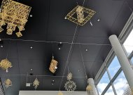Laukdama Velykų biblioteka pasipuošė šiaudinių sodų ekspozicija