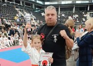 Čempionės taurę Šiauliuose iškovojusi Adrija Mačytė su treneriu Artūru Enčeriu